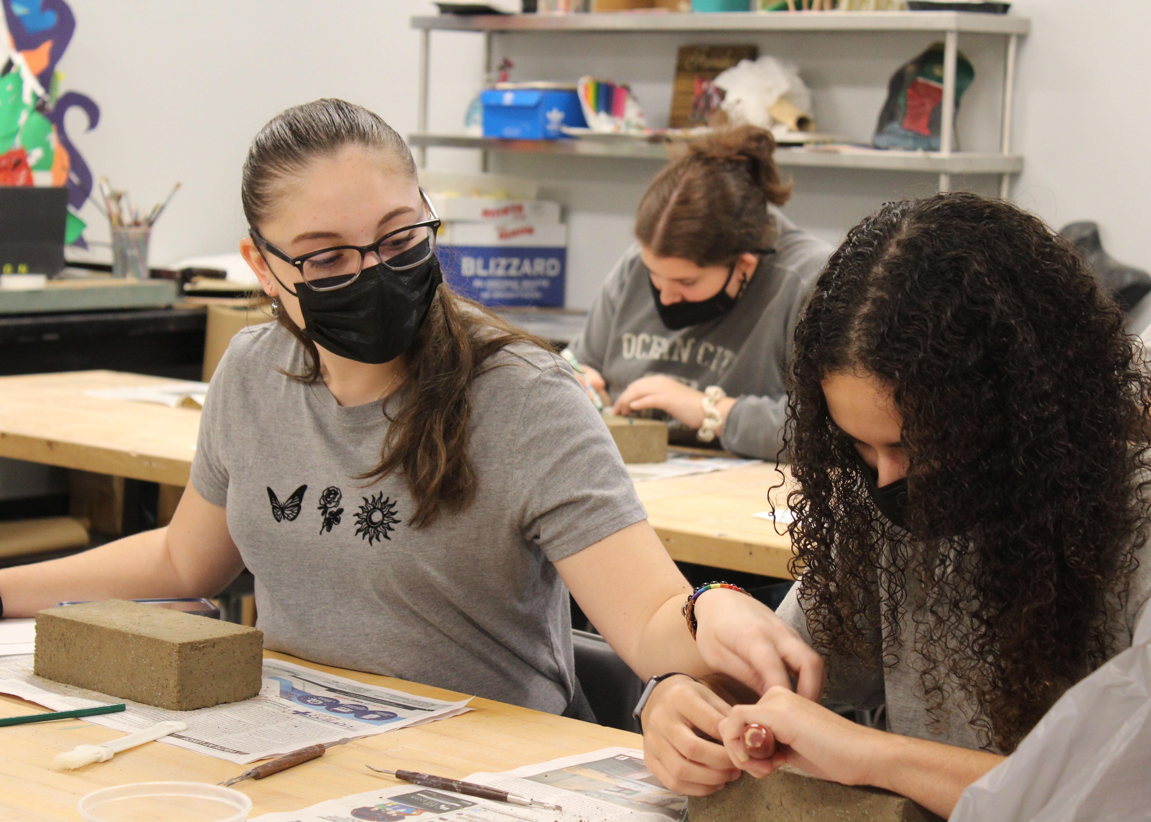 Students carving bricks