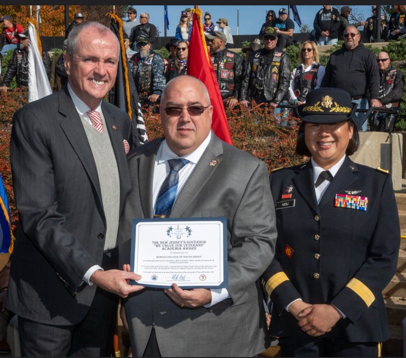 John Ryder accepting award from Governor Murphy