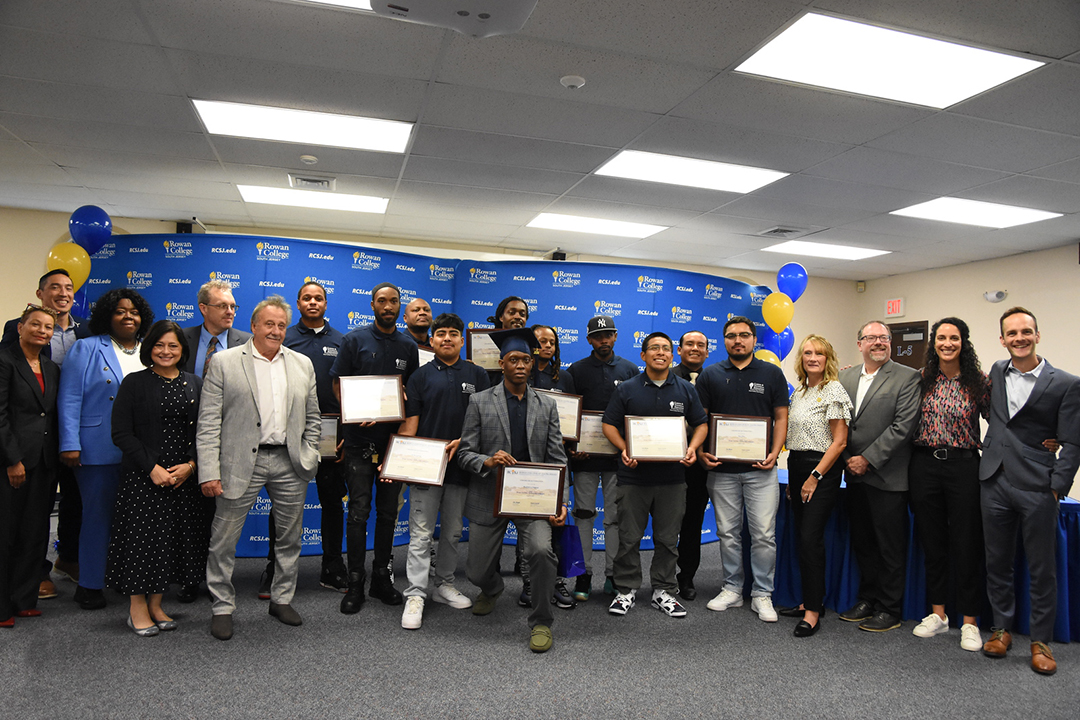 Wind program graduates with partners and sponsors
