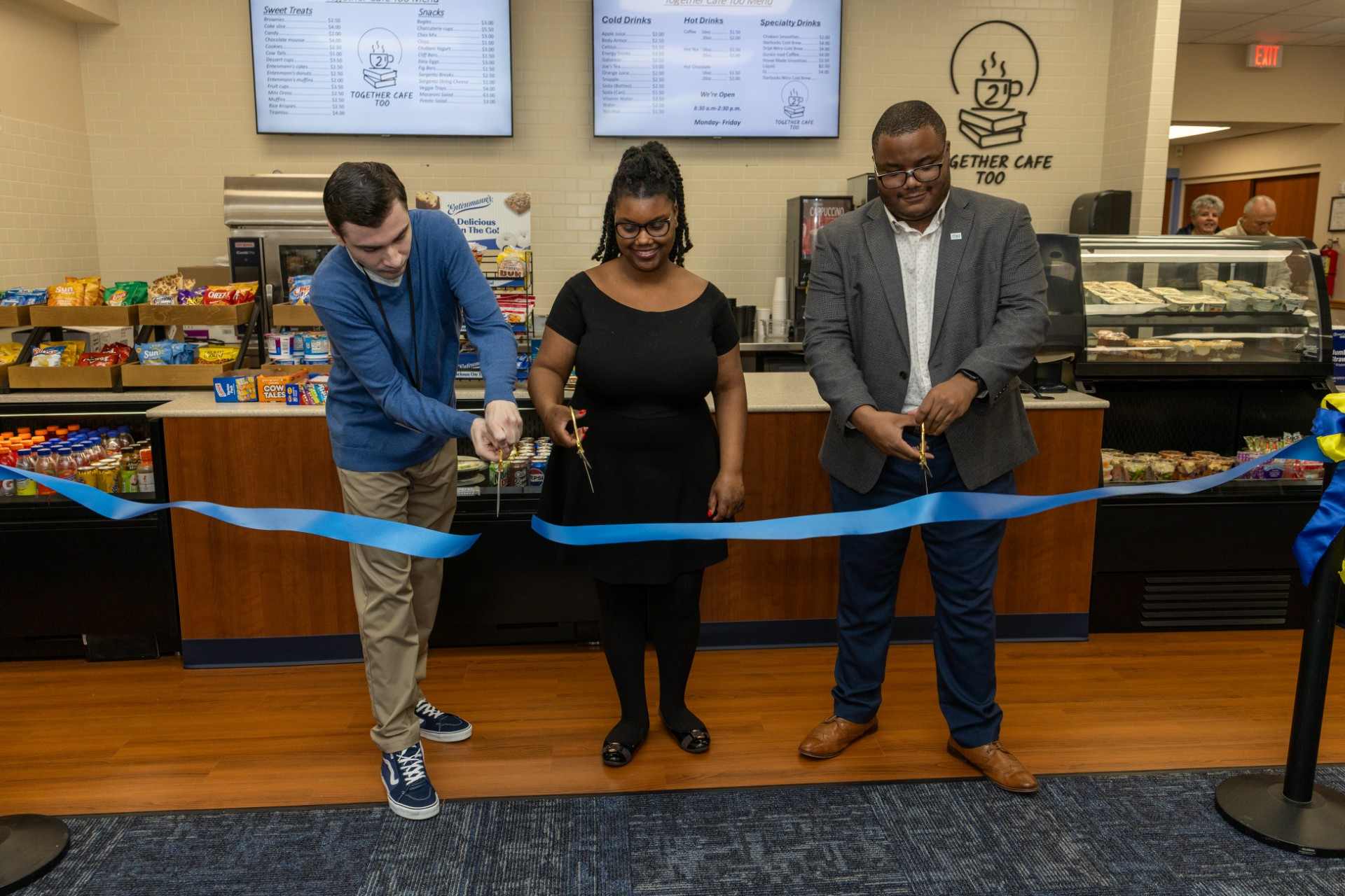 RCSJ ACT Students cutting the ribbon for the grand opening