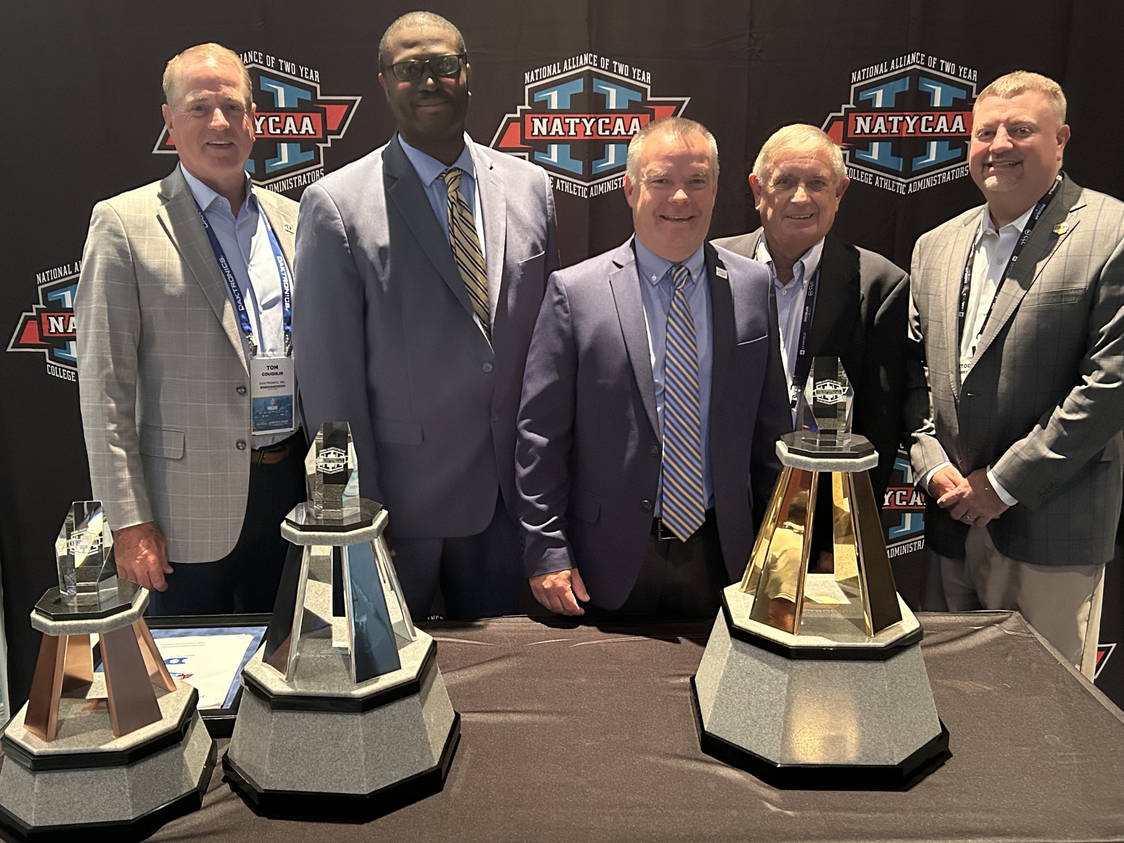 RCSJ Athletics Directors receiving NATYCAA Cup 