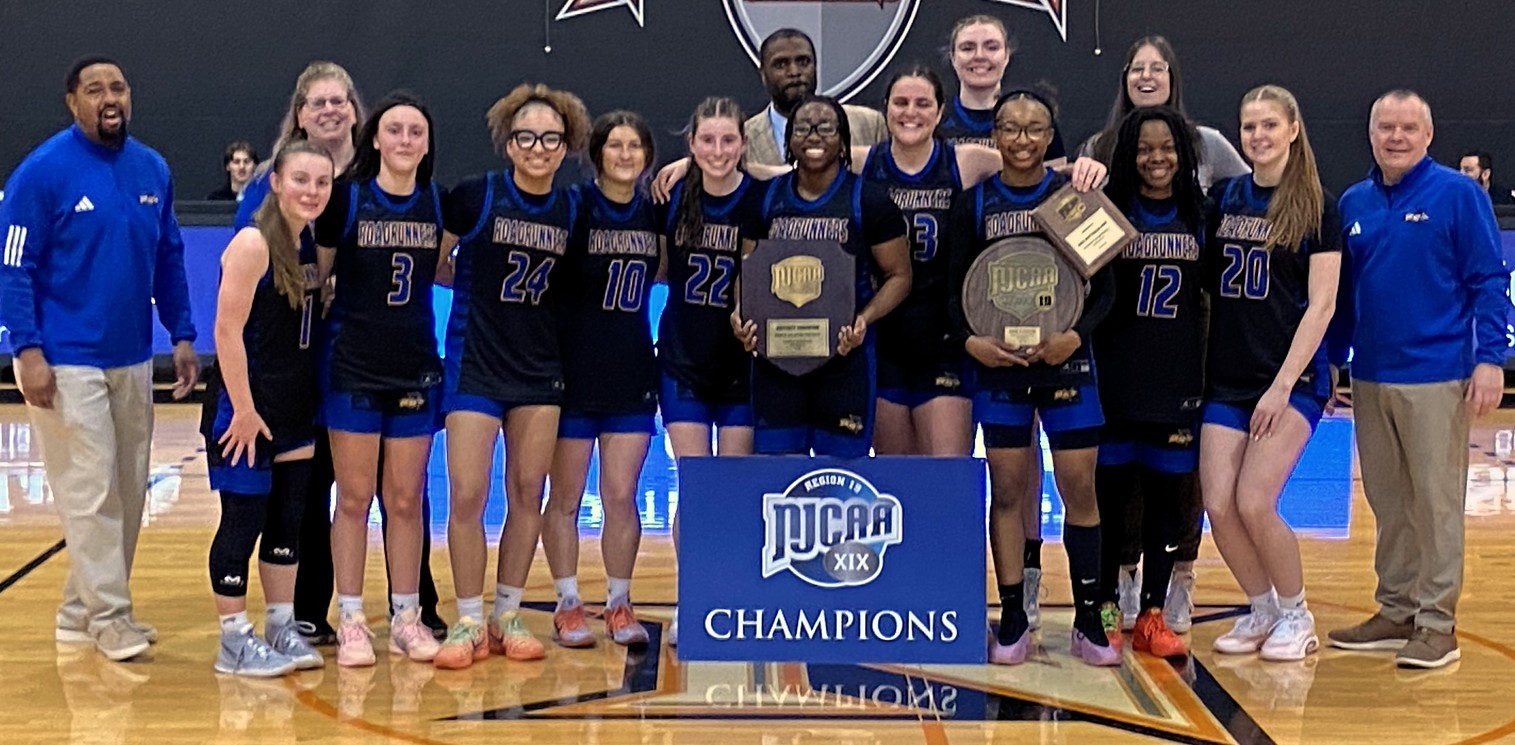 Women's Basketball team with trophies on February 28, 2026