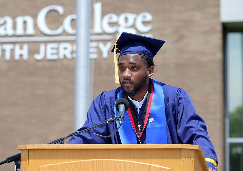 Khayri Ransom, Business Administration major, presents the student charge at RCSJ’s Gloucester Commencement on May 12, 2023.  