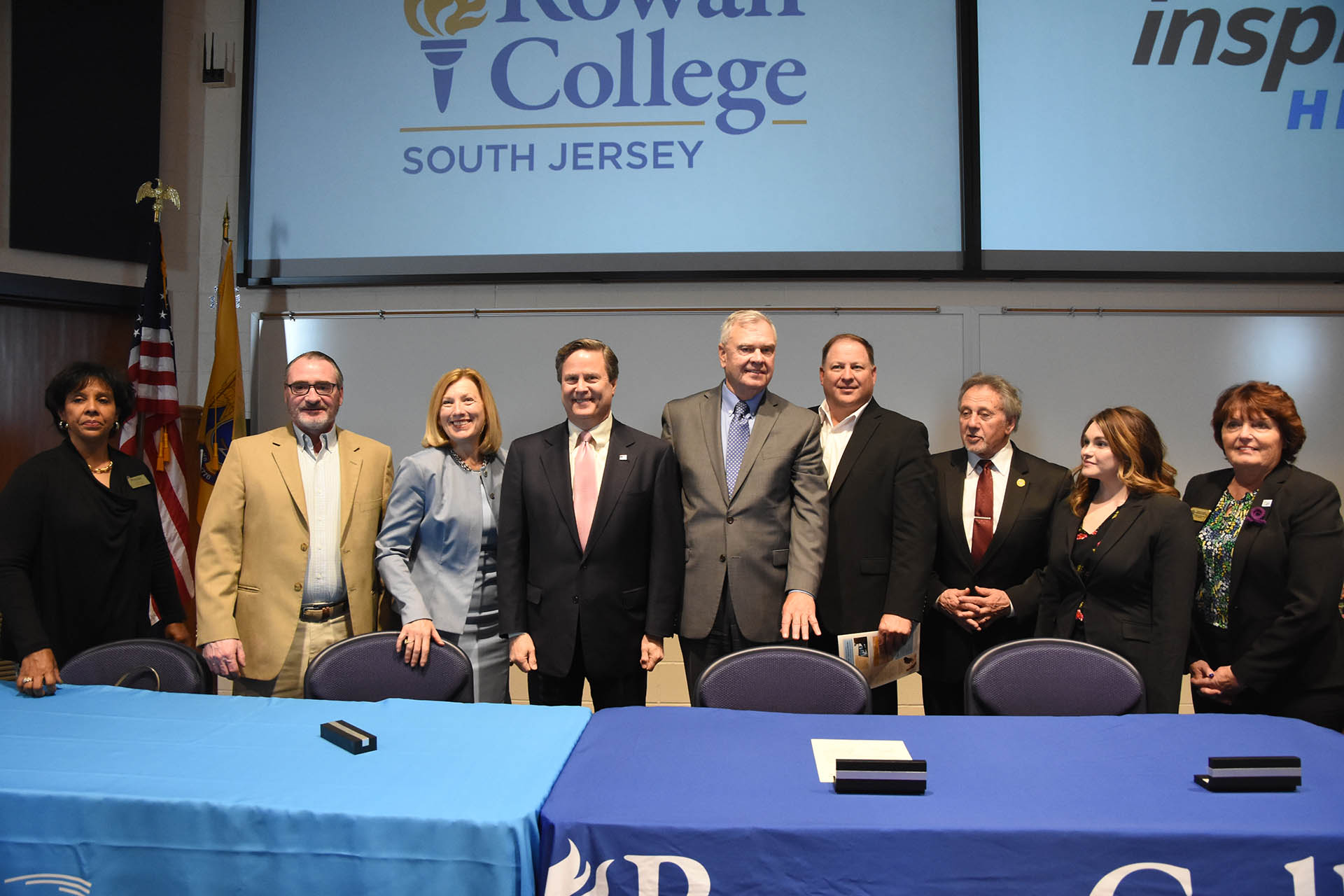 Signing event. Pictured left to right: RCSJ Board of Trustees Vice Chair Ruby Love, Gloucester County Board of Commissioners/Education Liaison Lyman Barnes, Inspira Health President/CEO Amy Mansue, Congressman Donald Norcross, RCSJ President Frederick Keating, Rowan University Board of Trustees Chair Chad Bruner, Gloucester County Board of Commissioners Director Frank DiMarco, RCSJ 2022 Nursing graduate/Inspira employee Heather Giovannitti and Cumberland County Board of Commissioners Director Darlene Barber.