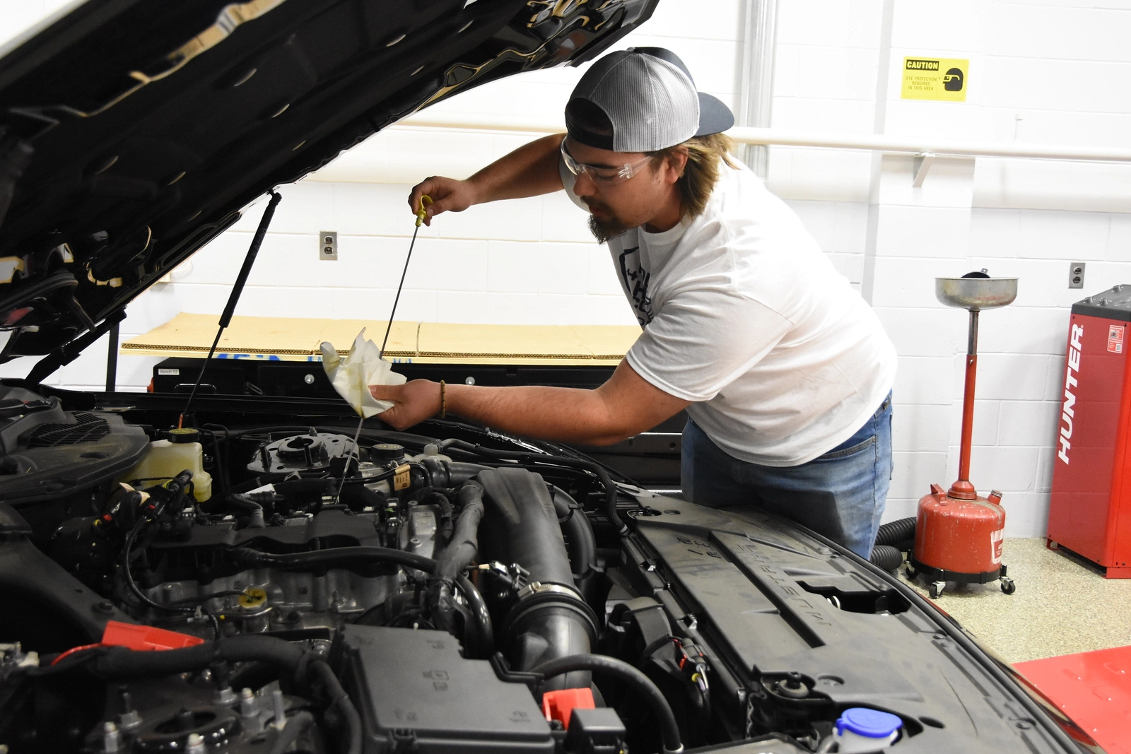 RCSJ student works on engine in the Ford ASSET.