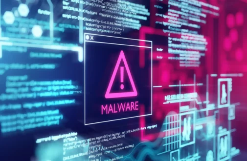 computer screen with the warning symbol Malware