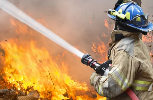 firefighter putting out fire