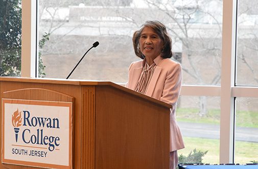 Lita Marcelo Abele speaking at a podium