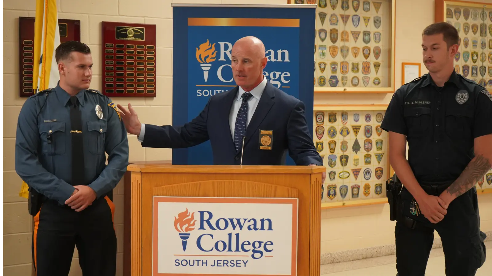 Sean McKenna, Director of the Gloucester County Police Academy, with 2024 Police Academy Graduates Officer Zachary Muhlbaier, Woolwich Township Police Department, and Officer Michael Scheer, Washington Township Police Department.