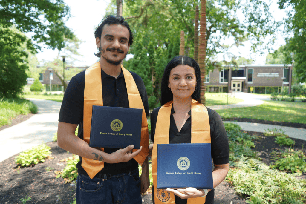 Mother and son, Branden and Brenda Zeitone, proudly display the diploma jackets they received after graduating together during Rowan College of South Jersey–Cumberland's Seventh Annual Commencement Ceremony in May.