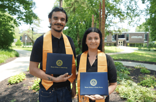 Mother and son, Branden and Brenda Zeitone, proudly display the diploma jackets they received after graduating together during Rowan College of South Jersey–Cumberland's Seventh Annual Commencement Ceremony in May.