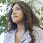 A student in a blazer