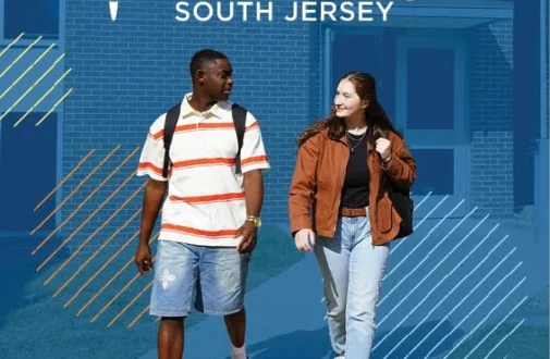 Two students walking on campus.