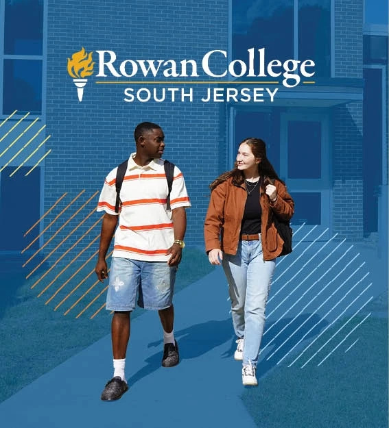Two students walking on campus.