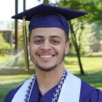 RCSJ Student wearing graduation cap and regalia