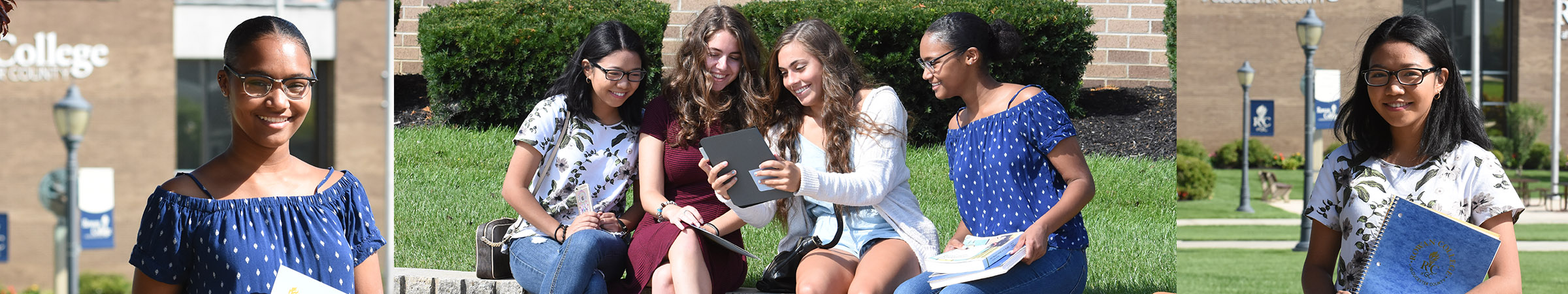 Students looking at an iPad on campus